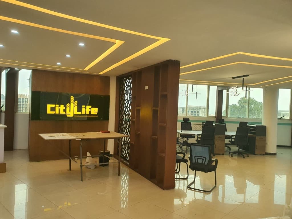 Open administrative workstation area and custom timber screen partition.