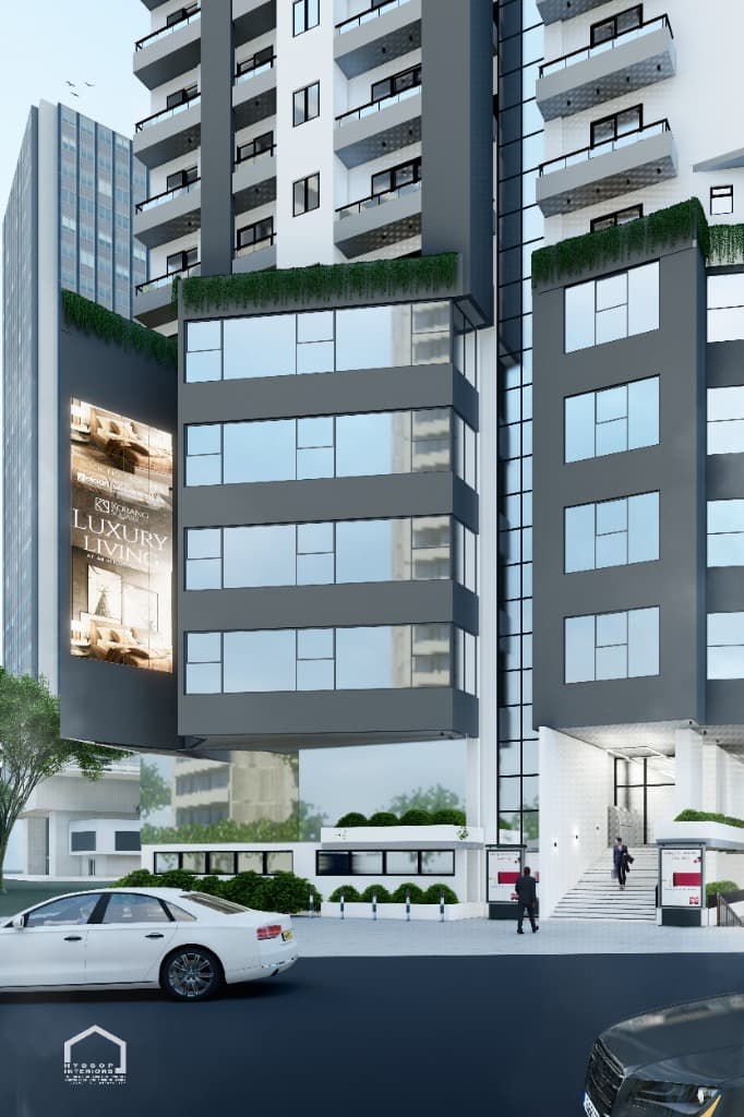 Low-angle pedestrian perspective highlighting grand entrance steps and commercial podium glazing.